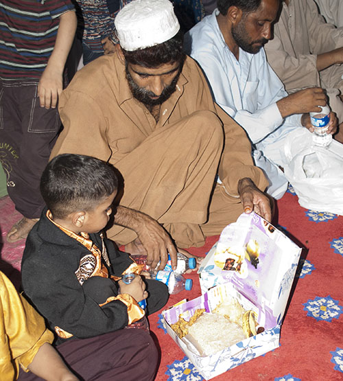 Kashmir Family with Food 