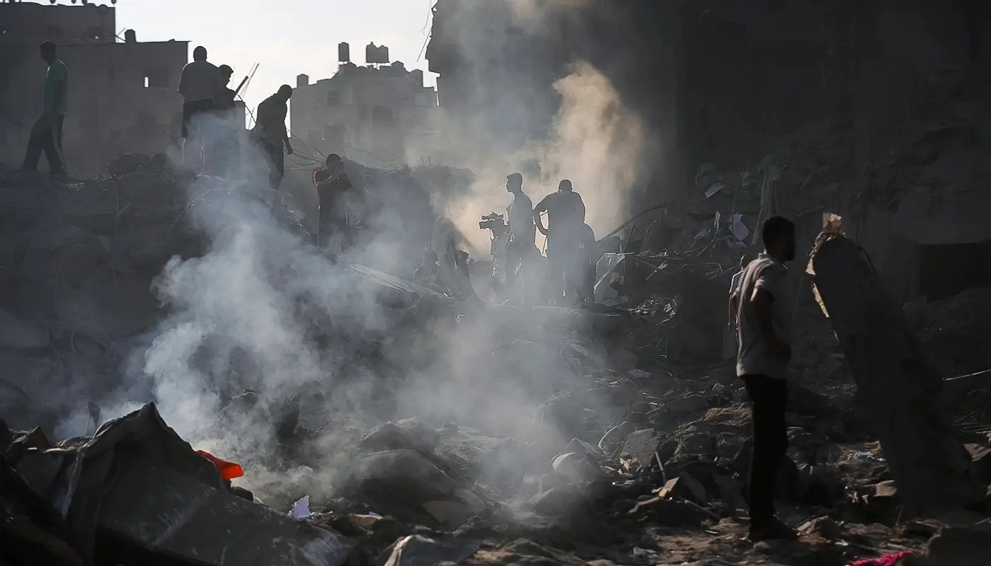 A group of people tackling a fire in Gaza
