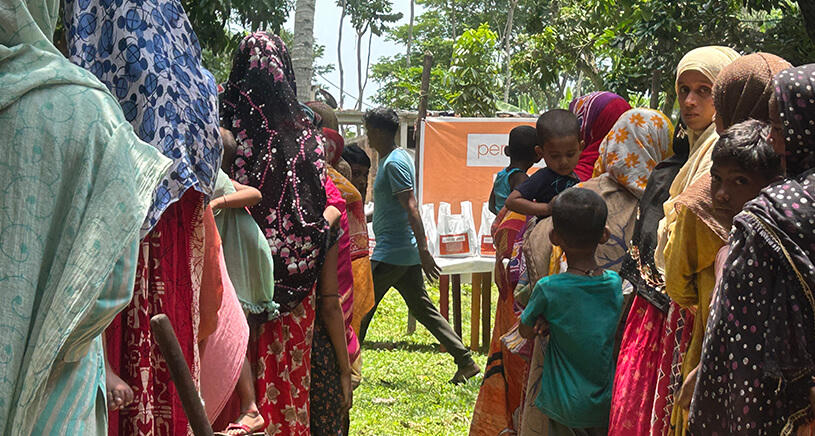 A group of people queue for Qurbani in Bangladesh.