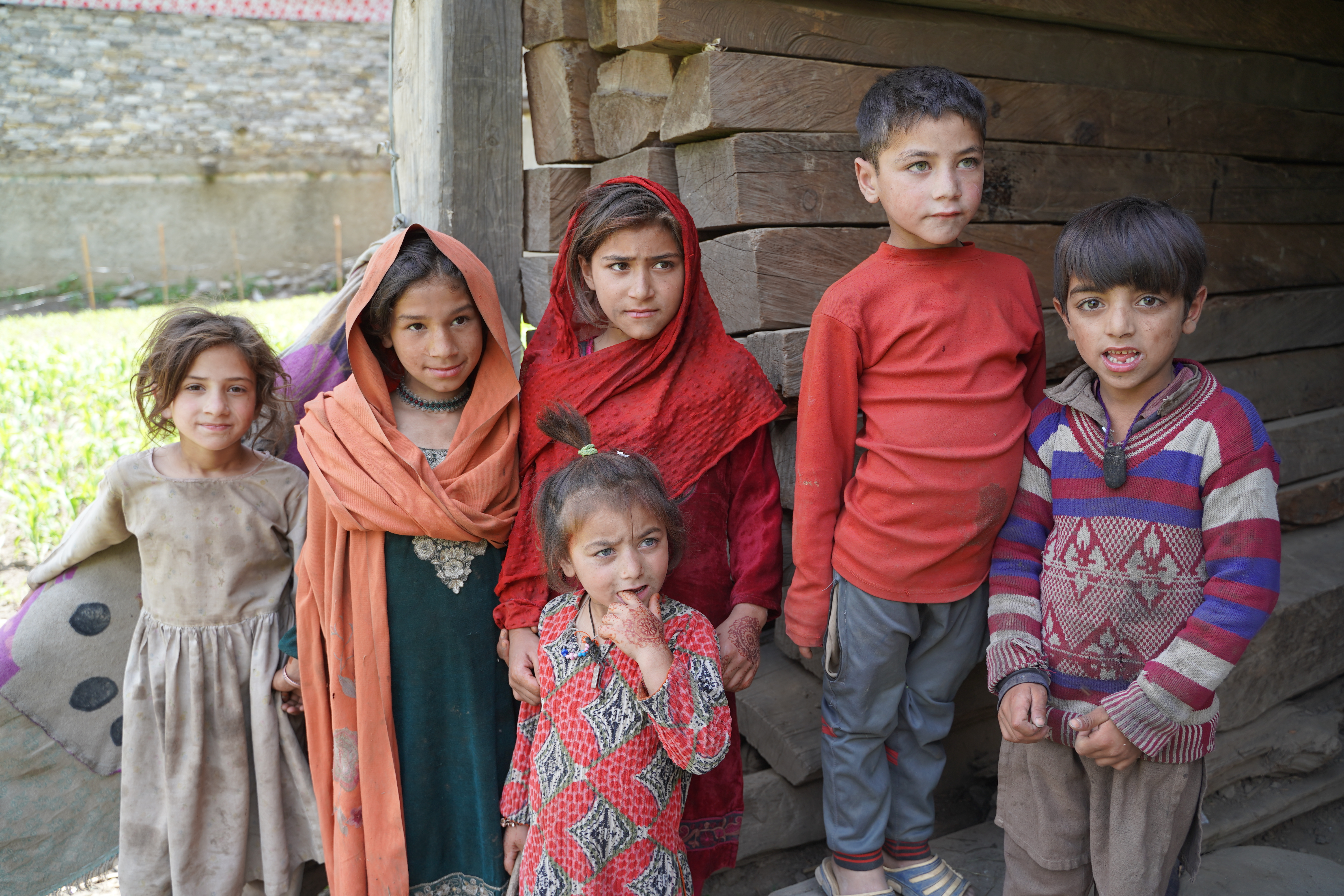 A group of children stood together.